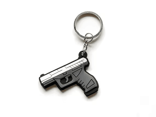 कस्टम लोगो मिनी कुंजी जंजीरों सिलिकॉन खिलौना बंदूक शीतल पीवीसी चाबी का गुच्छा